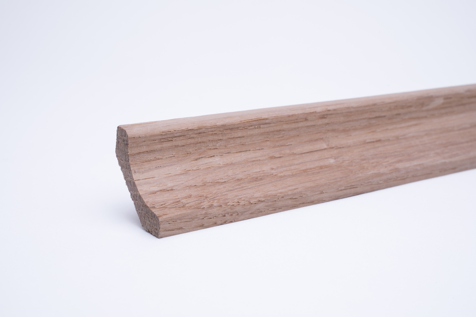 Real wood skirting as coved profile in oak untreated