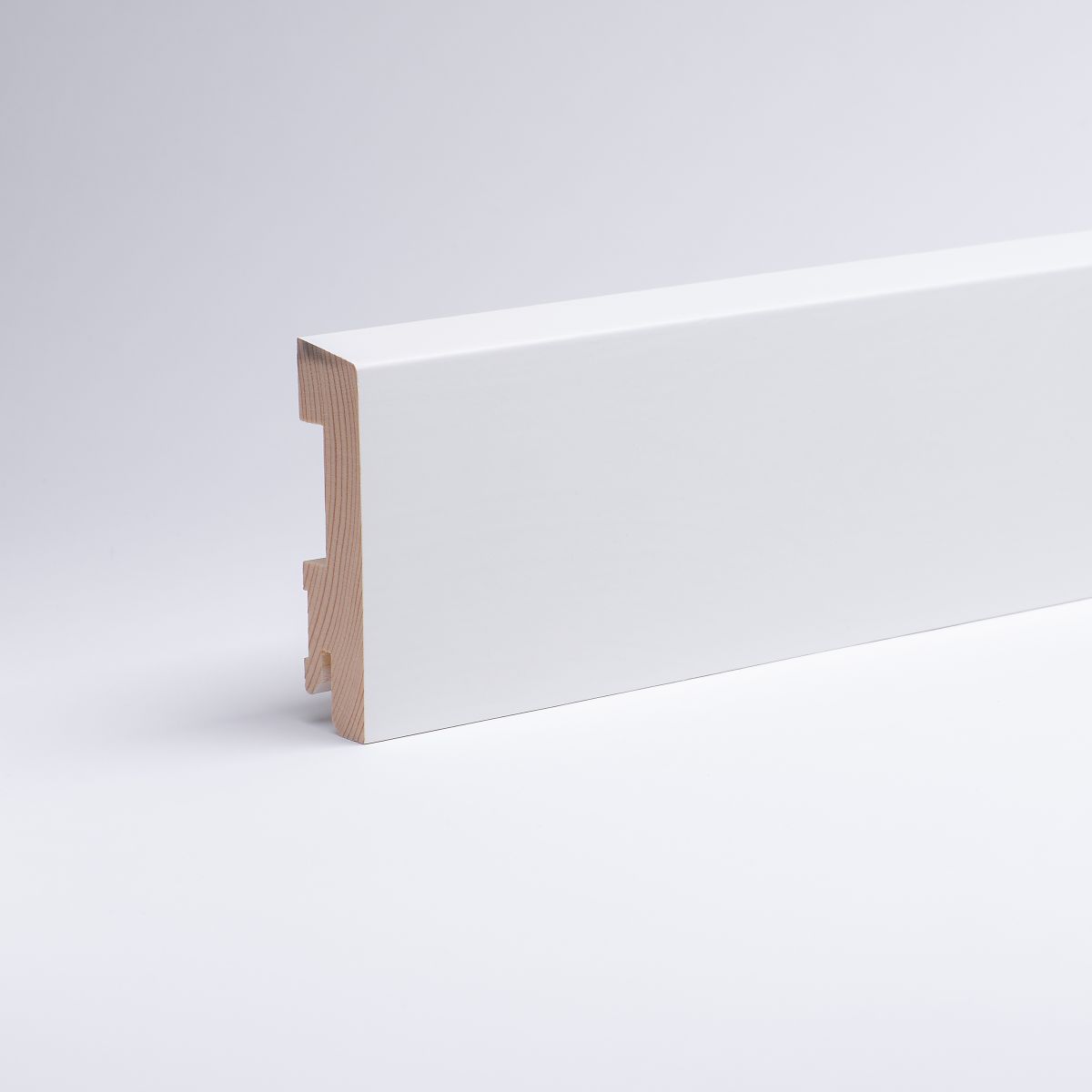 Solid wood skirting 80mm with chamfered front edge white varnished RAL 9010 Solid wood skirting 80mm with chamfered front edge white varnished RAL 9010