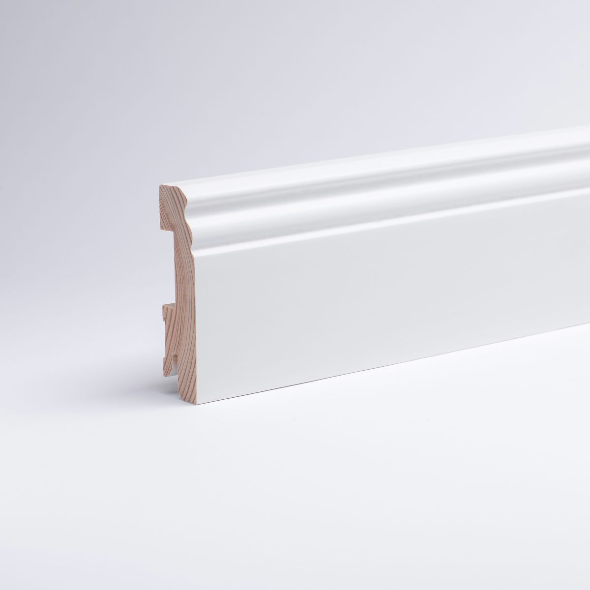 Solid wood skirting 80mm with Berlin profile white varnished RAL 9010 Solid wood skirting 80mm with Berlin profile white varnished RAL 9010