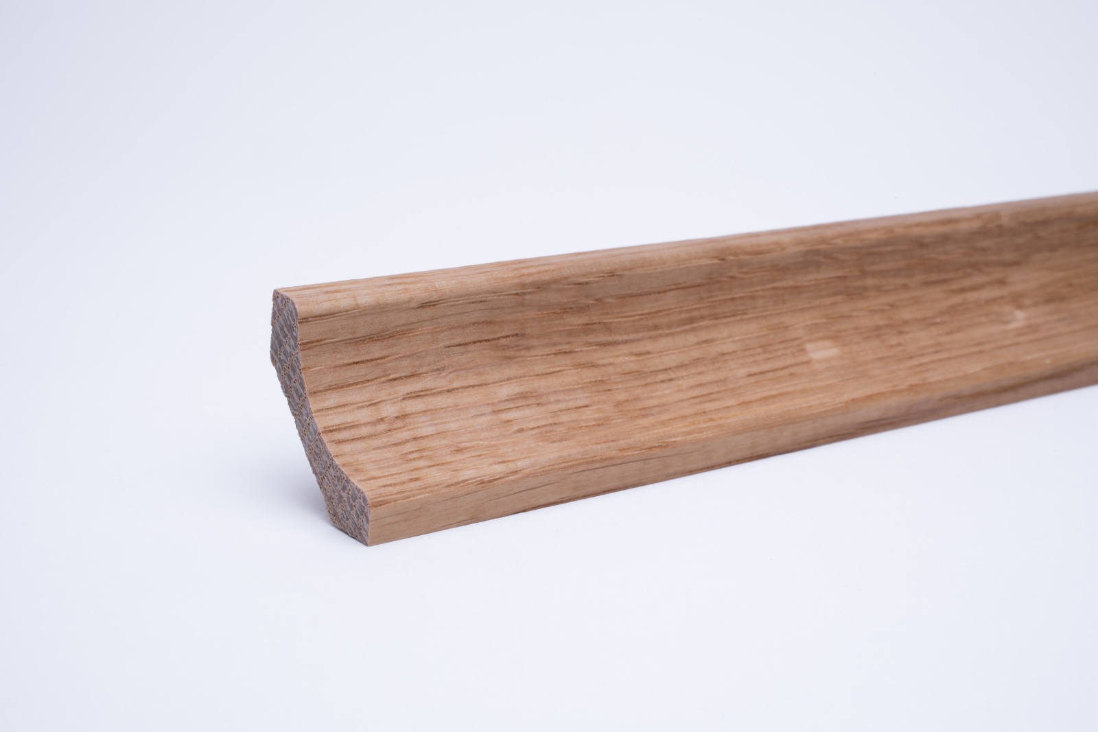 Real wood skirting as coved profile in oak oiled