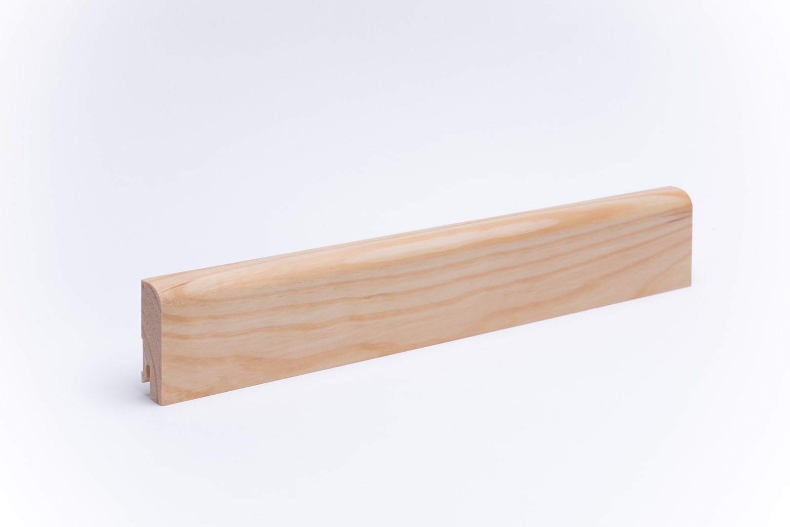 Solid wood skirting 60mm with rounded front edge oiled pine