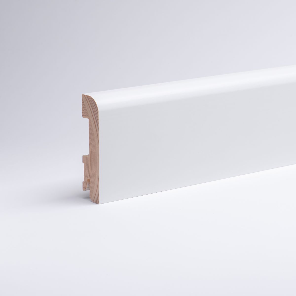 Solid wood skirting 80mm with chamfered front edge white varnished RAL 9010 Solid wood skirting 80mm with chamfered front edge white varnished RAL 9010