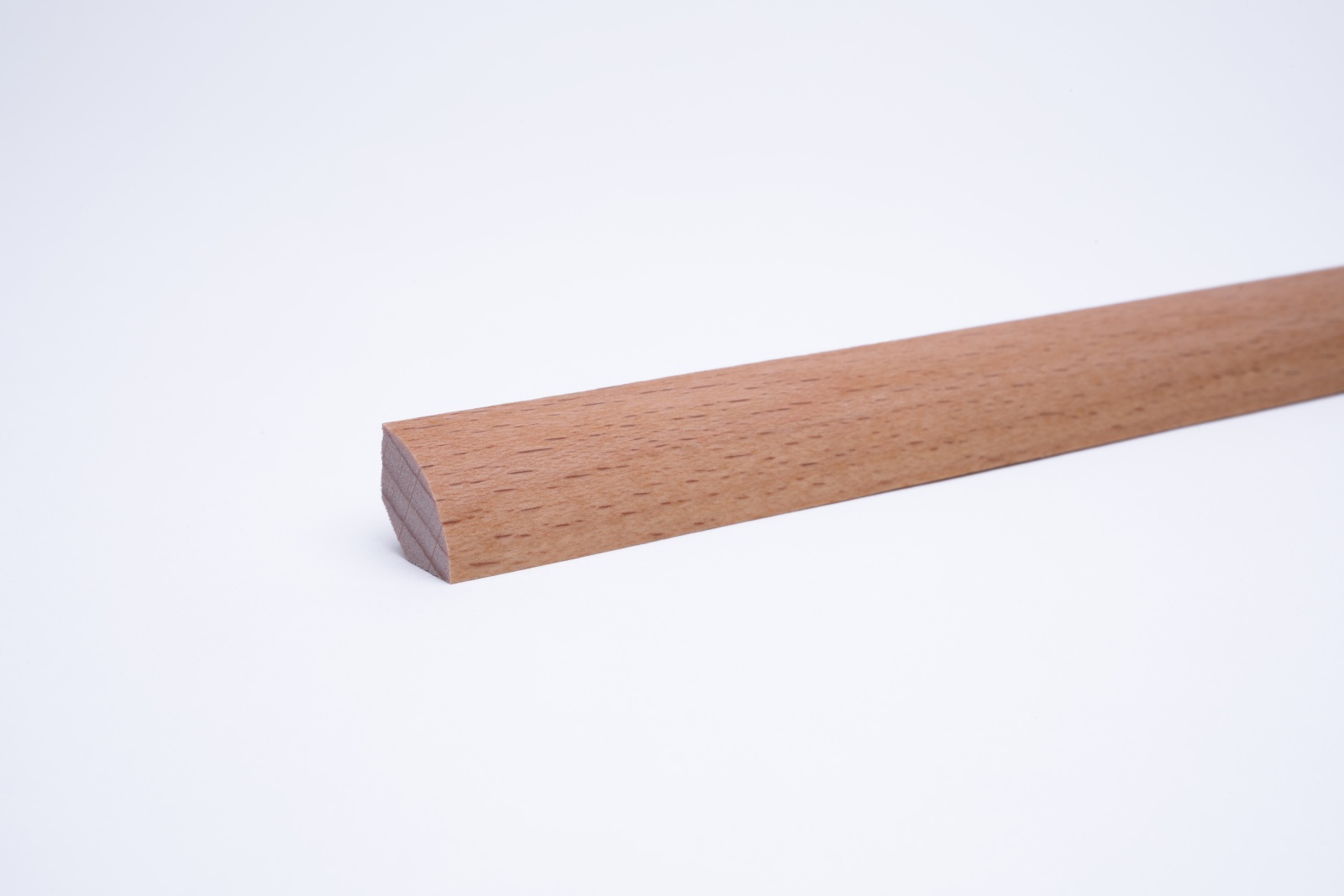 Real wood skirting as quarter round profile beech oiled