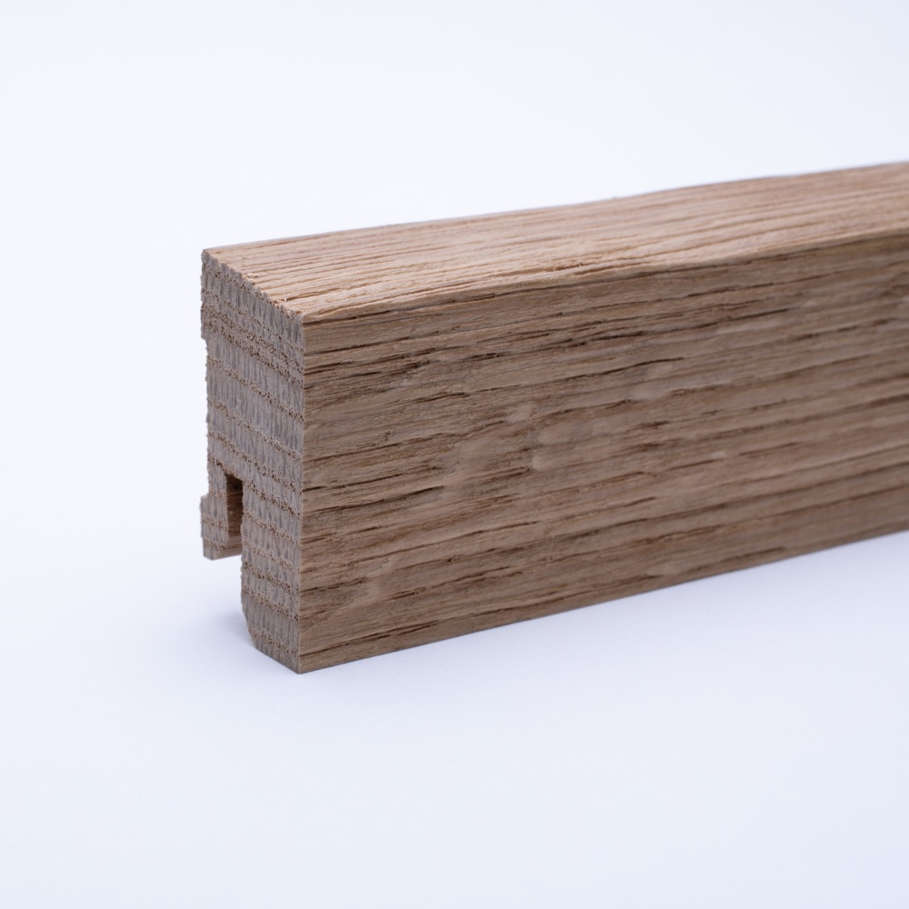 Solid wood skirting 40mm with chamfered front edge varnished oak Solid wood skirting 40mm with chamfered front edge varnished oak