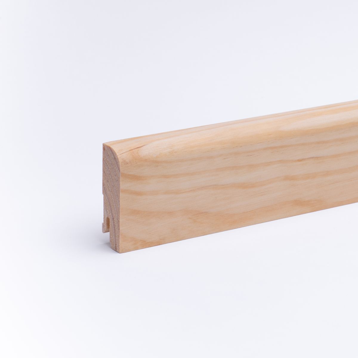 Solid wood skirting 60mm with rounded front edge oiled pine
